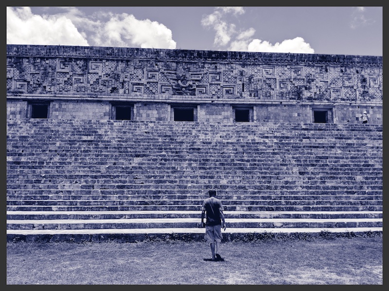 Neil stood in front of ruins